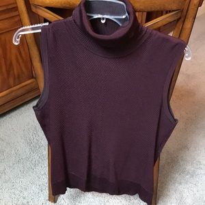 Sleek Sleeveless Turtleneck Blouse